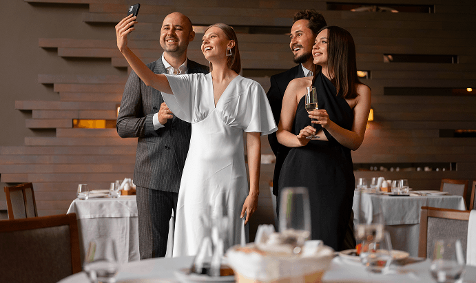 Guests raising glasses during a formal gathering